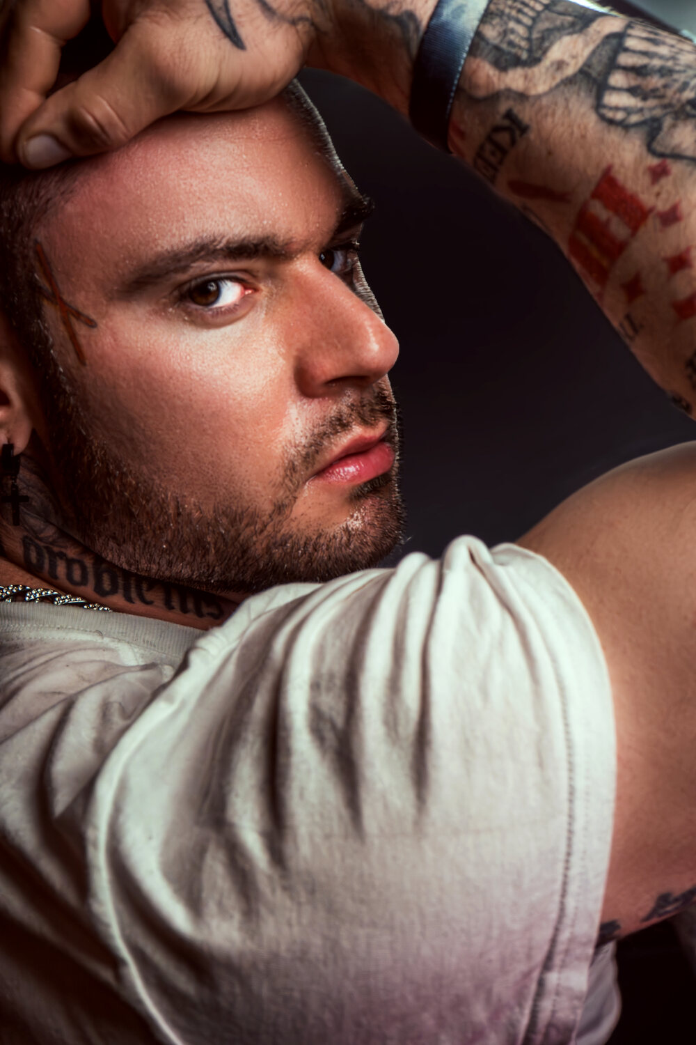 Editorial portrait, tattooed subject